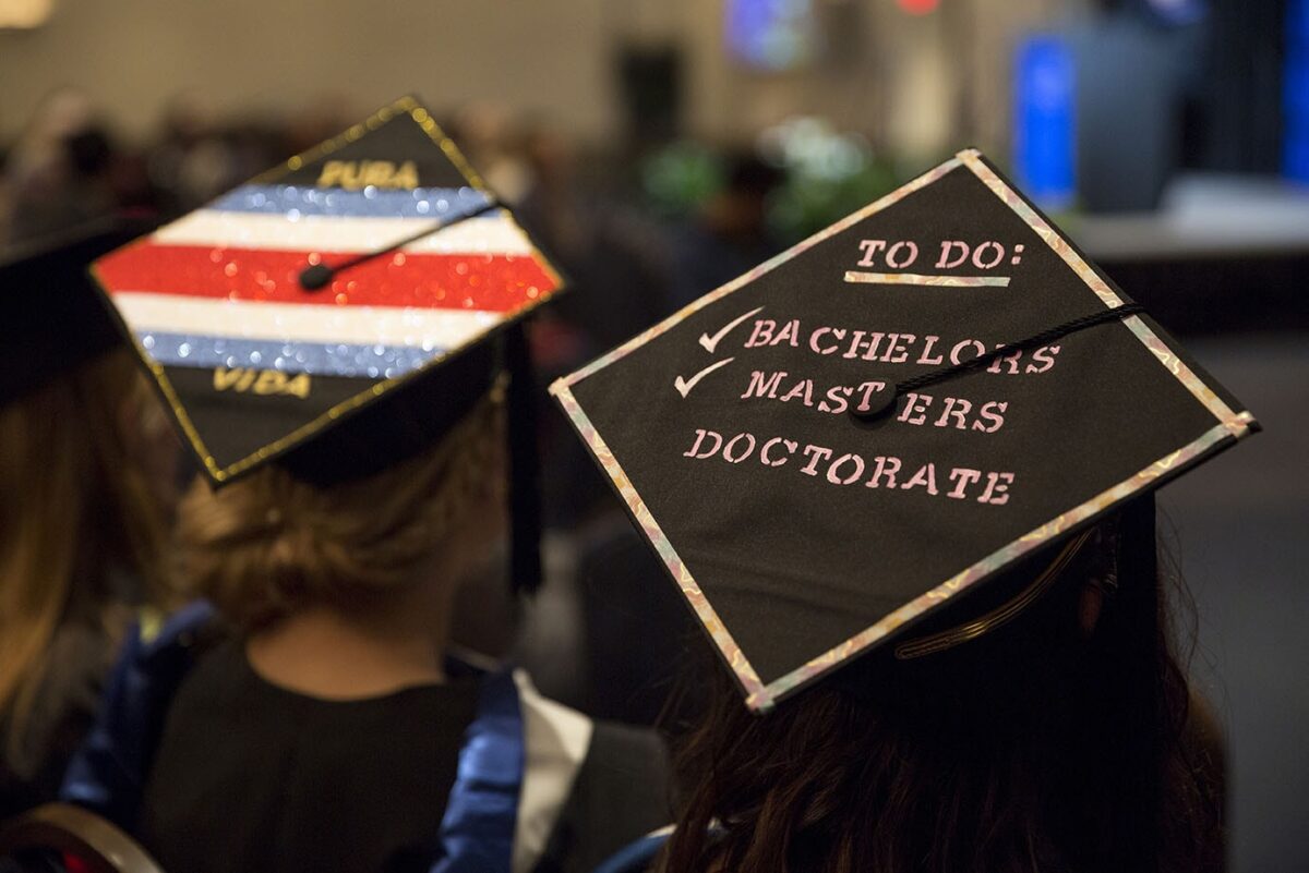 Graduation cap decorated with a checklist of bachelor’s, master’s and doctorate degrees