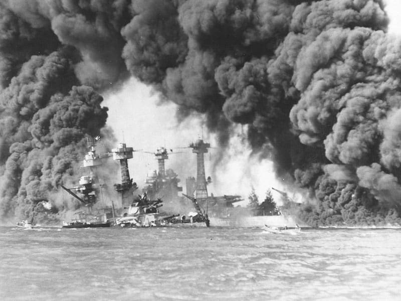 U.S.S. West Virginia and U.S.S. Tennessee on fire at Pearl Harbor, 1941