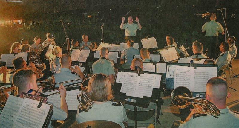 Warrant Officer W. Scott McDonald conducts the Army Signal Corps Band during Independence Day festivities at Fort Gordon. (Credit: Chris Thelen)